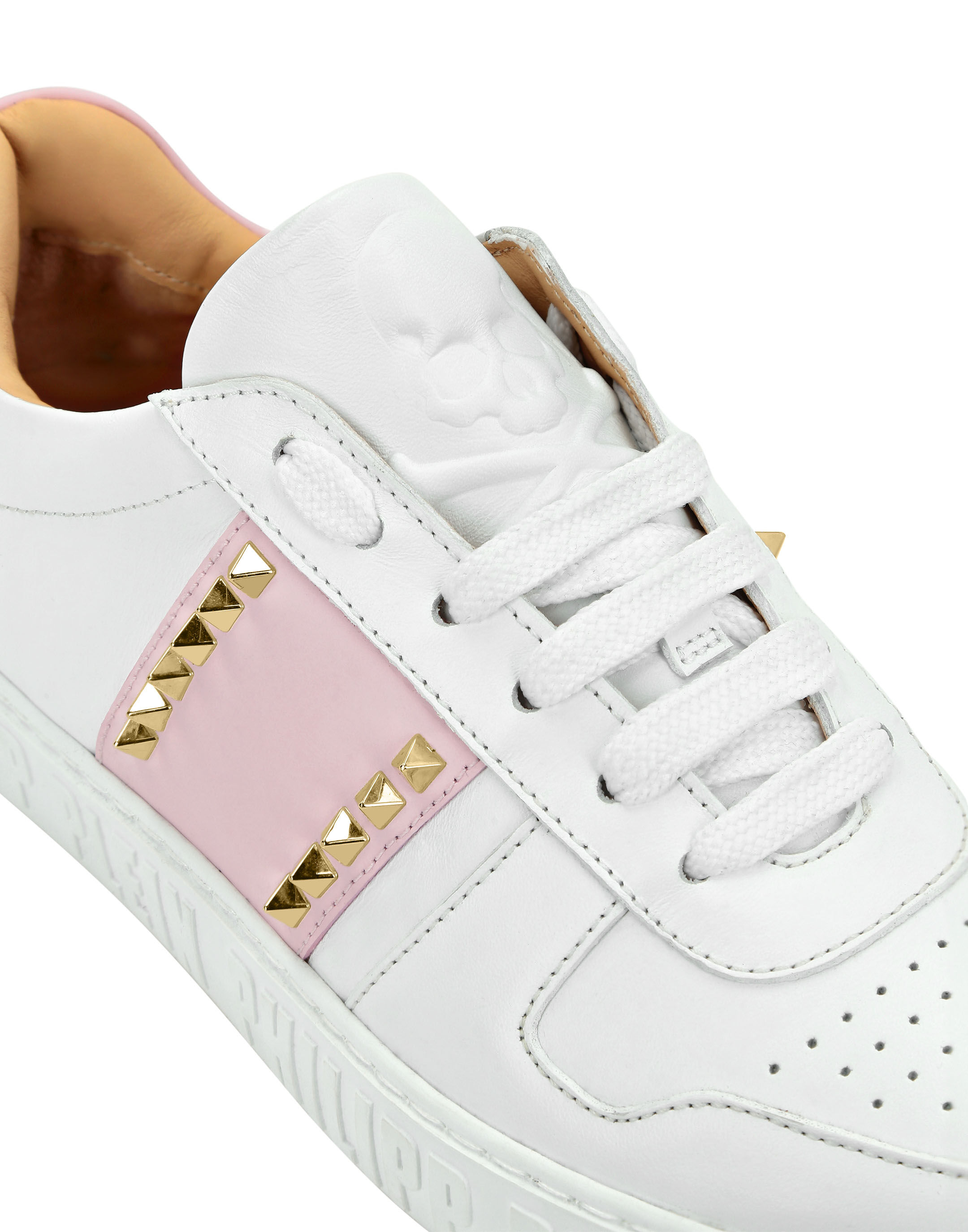 Sneakers with spikes and sale studs