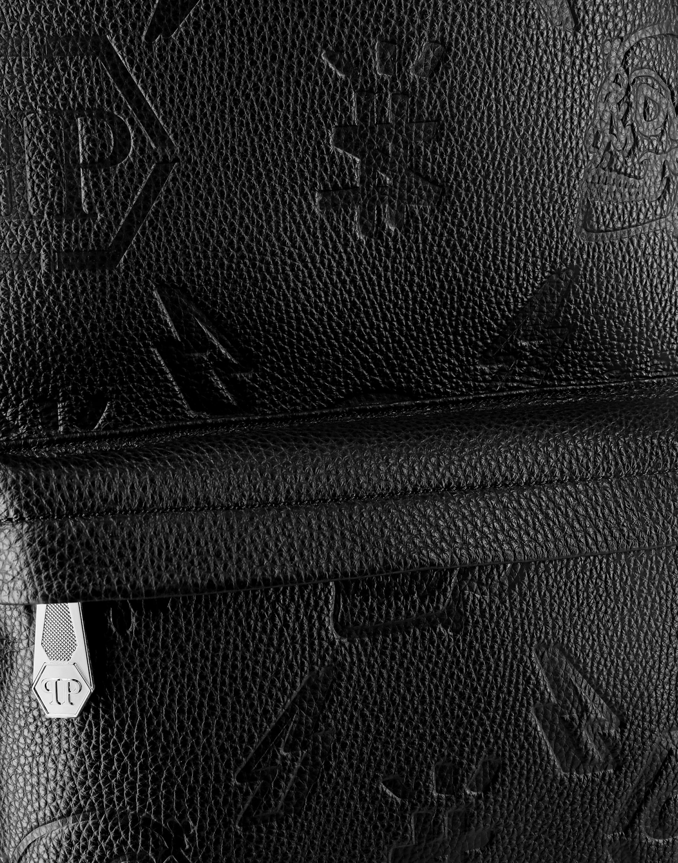 Leather Backpack embossed Monogram